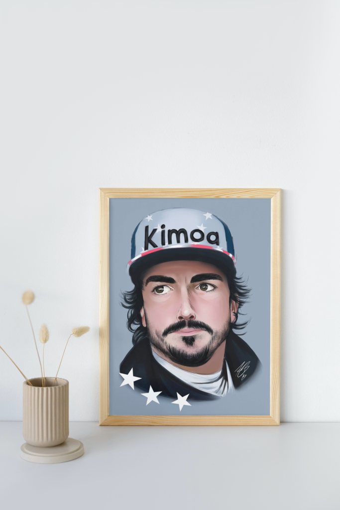 The aforementioned Fernando Alonso painting shown in a mock-up display frame for real life reference. It's in a wooden frame, leaning against a white wall, placed on top a white shelf. There's a small beige vase to the left of the frame with beige, fluffy plants in it that look similar to wheat.